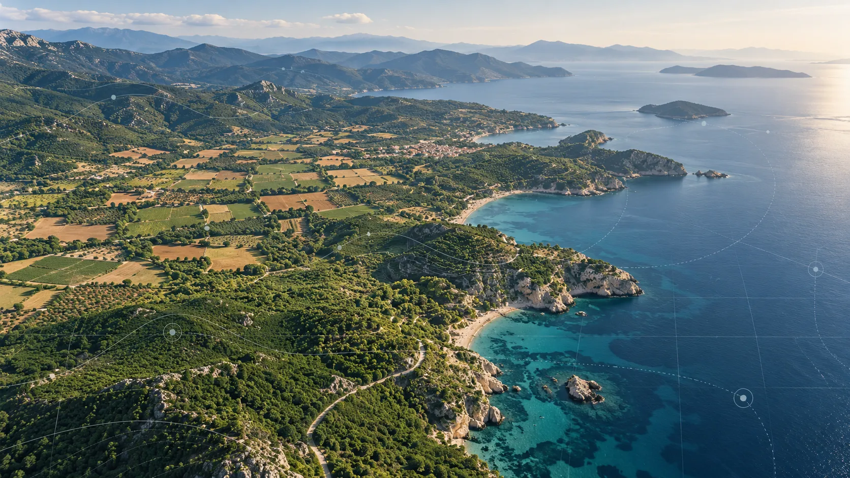 Aerial view of a coastline where farmland, forest and sea meet, overlaid with a monitoring network